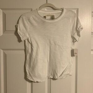 ** NEW WITH TAGS ** FREE PEOPLE We The Free white baby tee in size medium